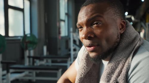Man Tired After Workout in Gym