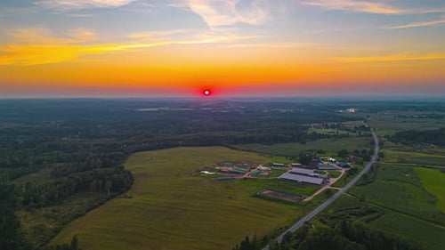 Orange Color Sky Horizon Over Countryside Town During Sunset. Timelapse