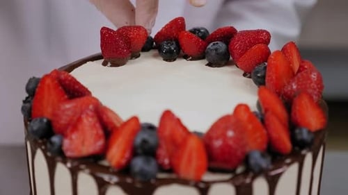 Cake Decoration with Fresh Strawberries and Blueberries
