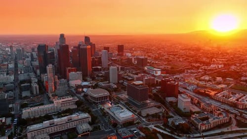 Pink sunset light illuminating the scenery of Los Angeles, California, USA.
