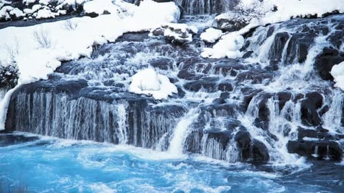 Waterfall in Iceland Snowy Mountain and Cold River Winter Pure Glacier Water