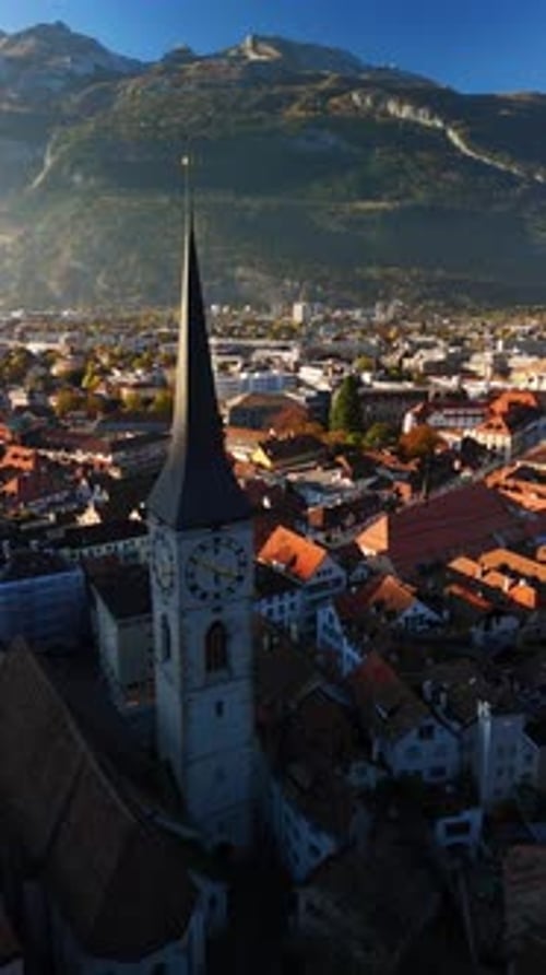Aerial view of the historic town of Chur Switzerland oldest city, aerial drone vertical video