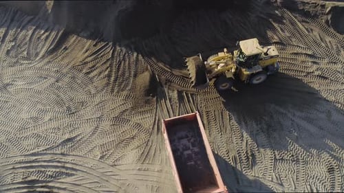 Excavator Clearing Beach