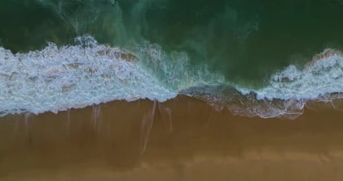 Aerial View on Turquiose Sea Waves Breaking on Sandy Coastline Top Down View on Blue Turquoise Ocean