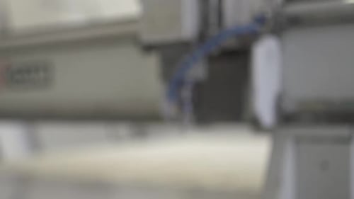 Cnc close up shot with shallow depth of field. Industrial cutting and drilling Working process on me