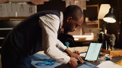 Tailor Checking Material in Workshop