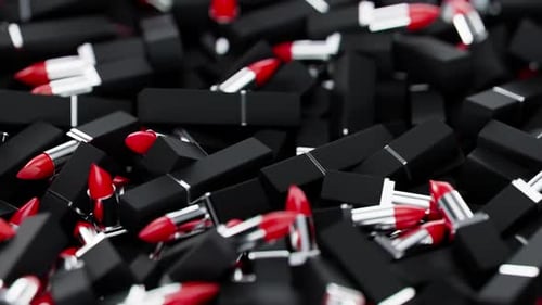 Move Over a Batch of Opened and Closed Red Lipsticks in a Black Tubes with Shiny Metallic Parts