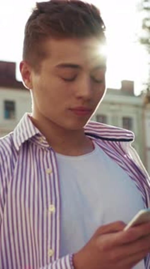 Happy Face Young Man Stand on Street Use Phone Look at Camera Sunlight Work Mobile Gadget Outside