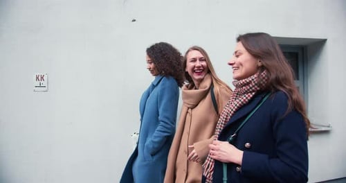 Side View Happy Young Attractive Female Friends Enjoying Weekend Meeting Together Walking Along City