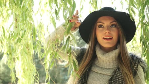 Fashion Woman Relaxing In Park