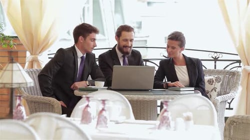 Engaging Business Lunch in a Stylish Restaurant