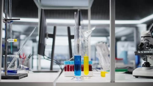 Laboratory Equipment and Colorful Liquids for Scientific Research