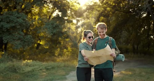 Couple Hiking, Reading Map, Exploring Forest