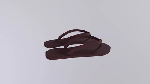 Braune Flip-Flops auf grauem Hintergrund