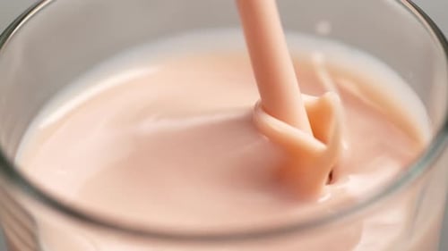 Pouring Strawberry Smoothie In Slow Motion.