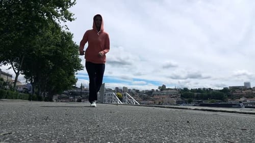 Woman Jogging In City, Low Angle, Super Slow Motion 240fps