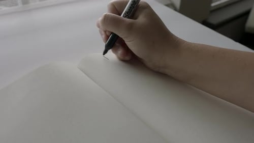 "TO DO" Writing in Work Journal in Office Setting