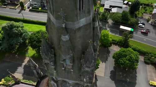 St. Cathedral, County Monaghan, Ireland, September 2022. Drone orbits the church tower counter clock