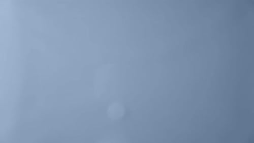 Gentle Ripple on a Light Blue Surface