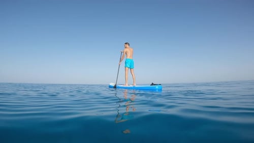 Man on Stand Up Paddle