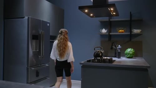 Young Woman Takes a Chocolate Pie Out of the Oven Girl Makes Pastry at Home Female Performs Homemade