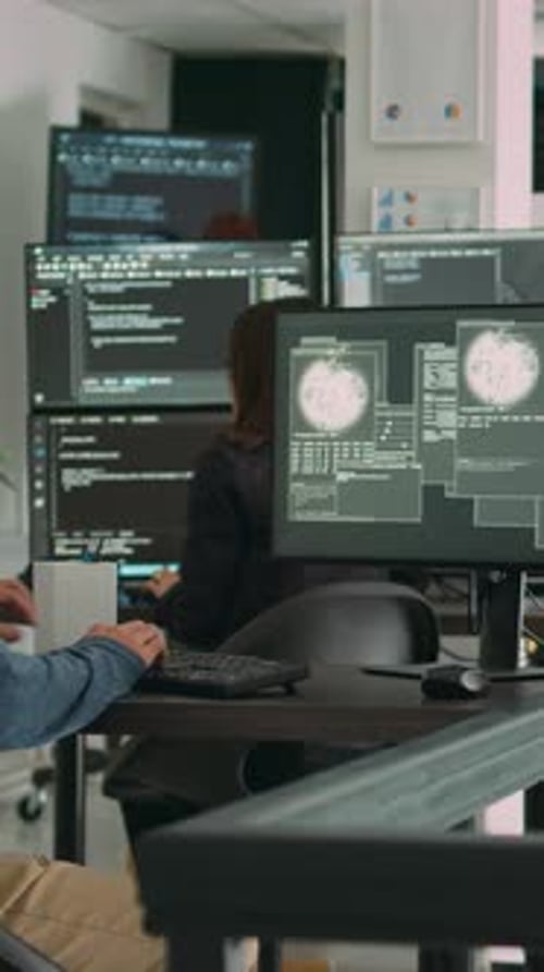 Vertical Video Asian Programer Focused on Writing Code Encounters Unexpected Compiling Error