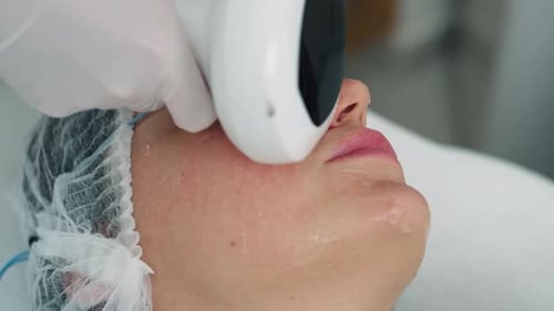 Woman Receives Professional Skin Treatment in Beauty Clinic