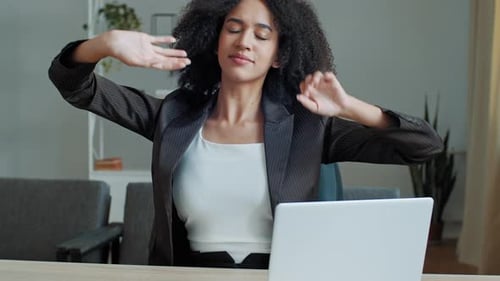 Tired Exhausted African Woman Businesswoman Employee Sit at Office Desk Feel Back Muscle Tension