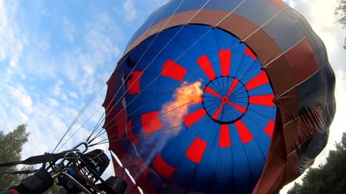Hot Air Balloon Inflating with Flames and Air