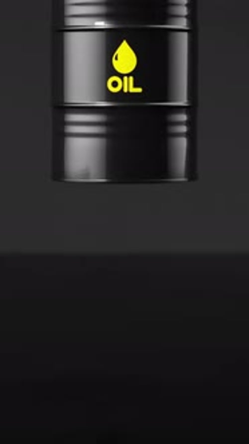 Black Metal Oil Barrel Falling Into a Pond of Crude Oil with a Dramatic Liquid Splash Vertical Video