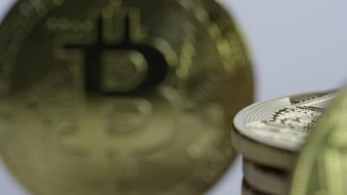 Crypto Currency - Bitcoin on white with stack