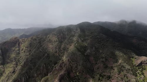 Aerial Drone View of Mountains and Cliffs in Northern Tenerife on a Cloudy Spring Day