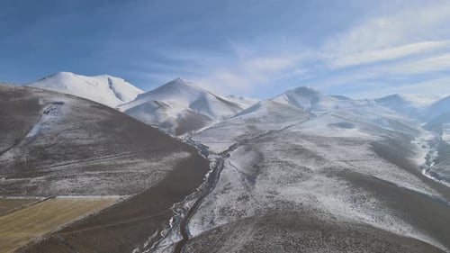 aerial snowy mountains hill