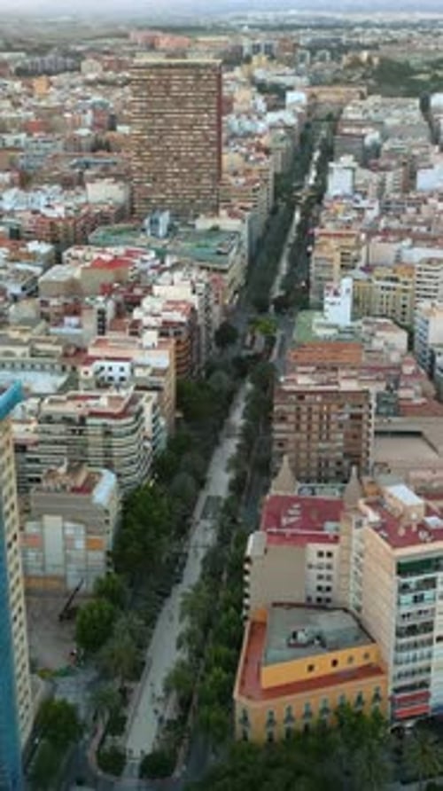 Aerial drone view of the buildings in Valencia, Spain in daylight. Vertical