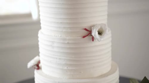 Elegant Tiered Wedding Cake with Floral Decorations