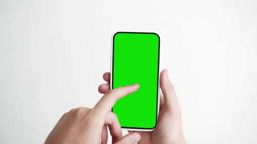 Person Touch Screen Smartphone With Green Chroma Key Close-Up. Guy Tapping Gesture On Cell Phone ...