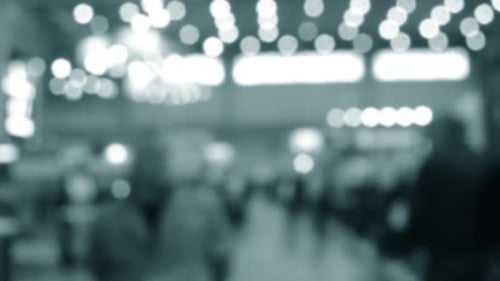 People Walking in Building Building with Walls Floor Ceiling Illuminated Lamps