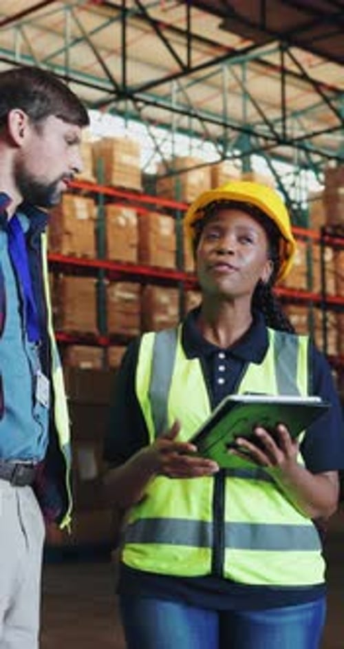 Warehouse team, tablet and people with discussion for shipping, inventory and distribution