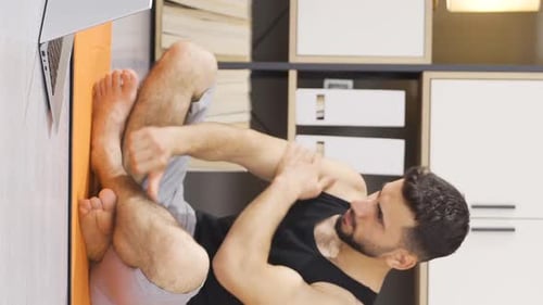 Vertical video of Fitness trainer gives online classes.