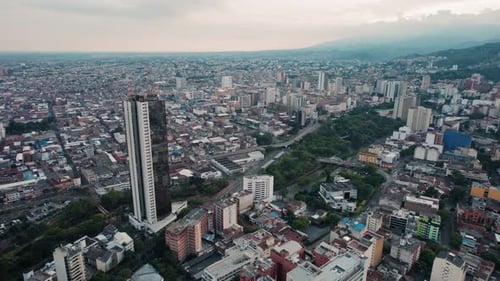 Cityscape with Mountains and Sunset in the Background - Cali, Colombia