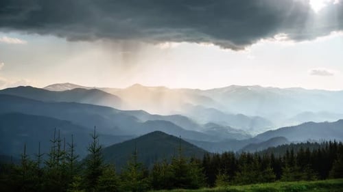 Dramatic Mountain Landscape with Storm Clouds and Sunlight