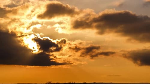 Dramatic Clouds at Golden Sunset