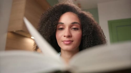 Woman Reads Book Close Up