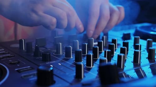 DJ Playing Music on Festival in Night Club Techno Musician with Headphones and Sunglasses Performing