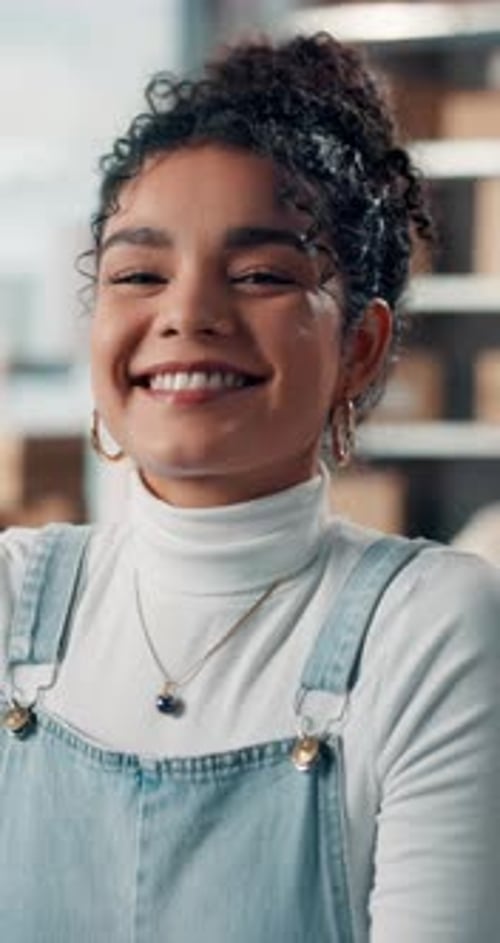 Face, laugh and woman in small business for shipping, distribution and confidence