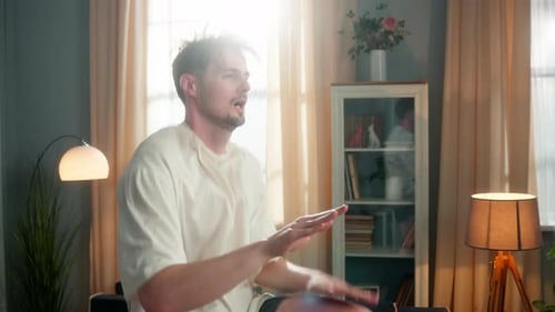 Man Doing High Knee Exercises Indoors for Fitness