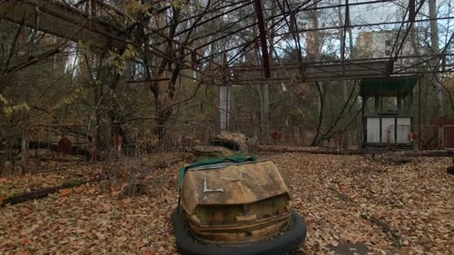 Decayed Autodrome with Bumper Cars in Ghost Town Pripyat in Radioactive Chernobyl Exclusion Zone