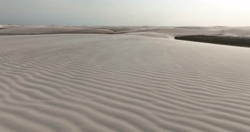 Flying Above Desert Sand Dunes Of Lencois Maranhenses National Park In Maranhao, Brazil. drone shot