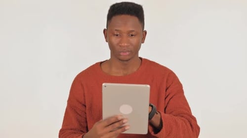 Man Using Tablet Device on White Background