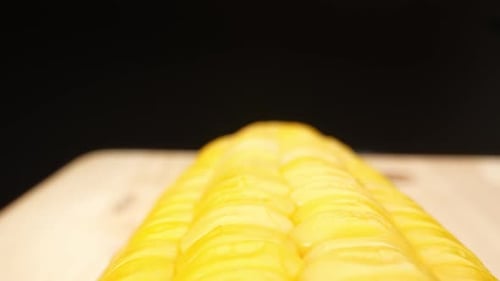 Bright Yellow Cooked Corn on Cob Close Up